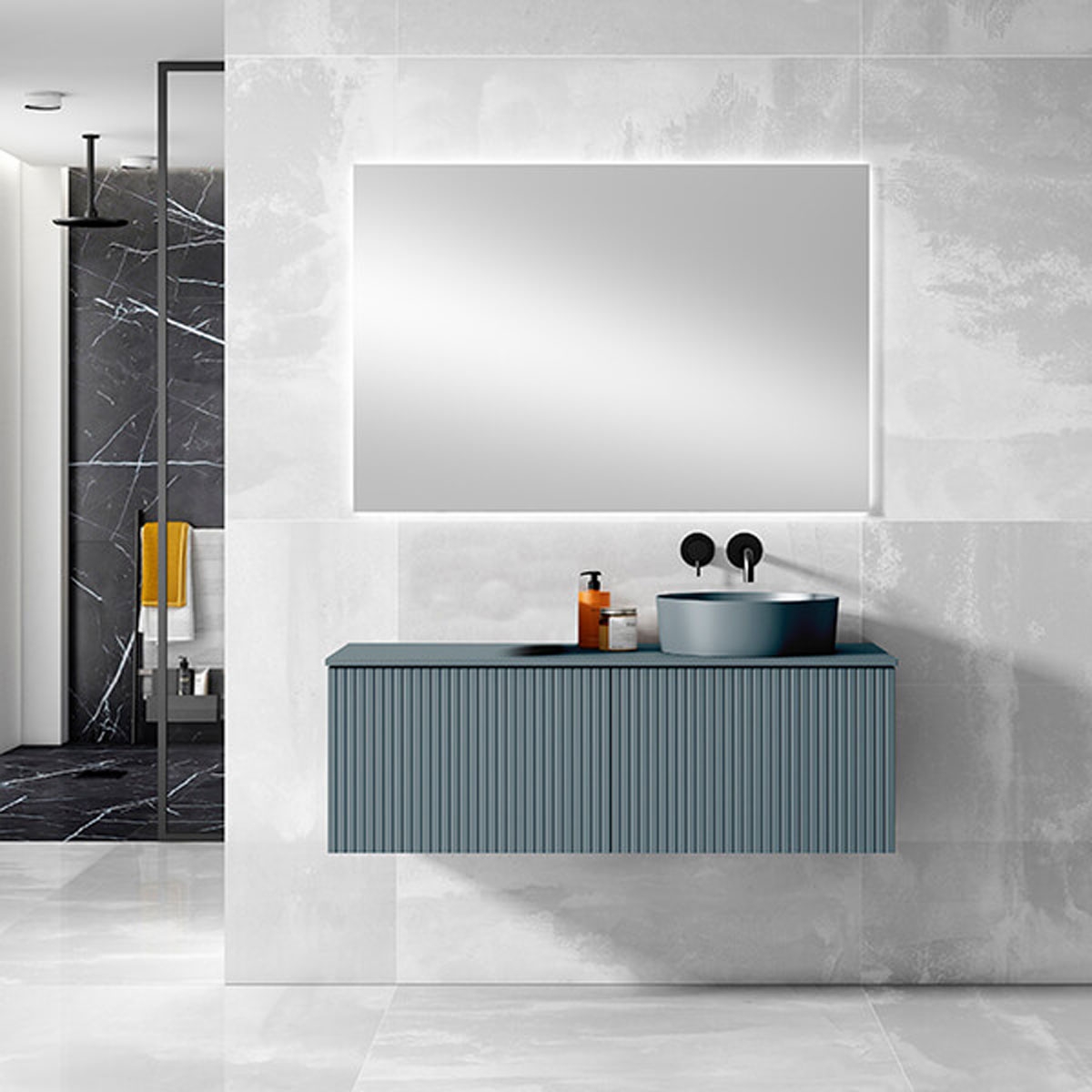 mueble de baño azul lavabo sobre encimera